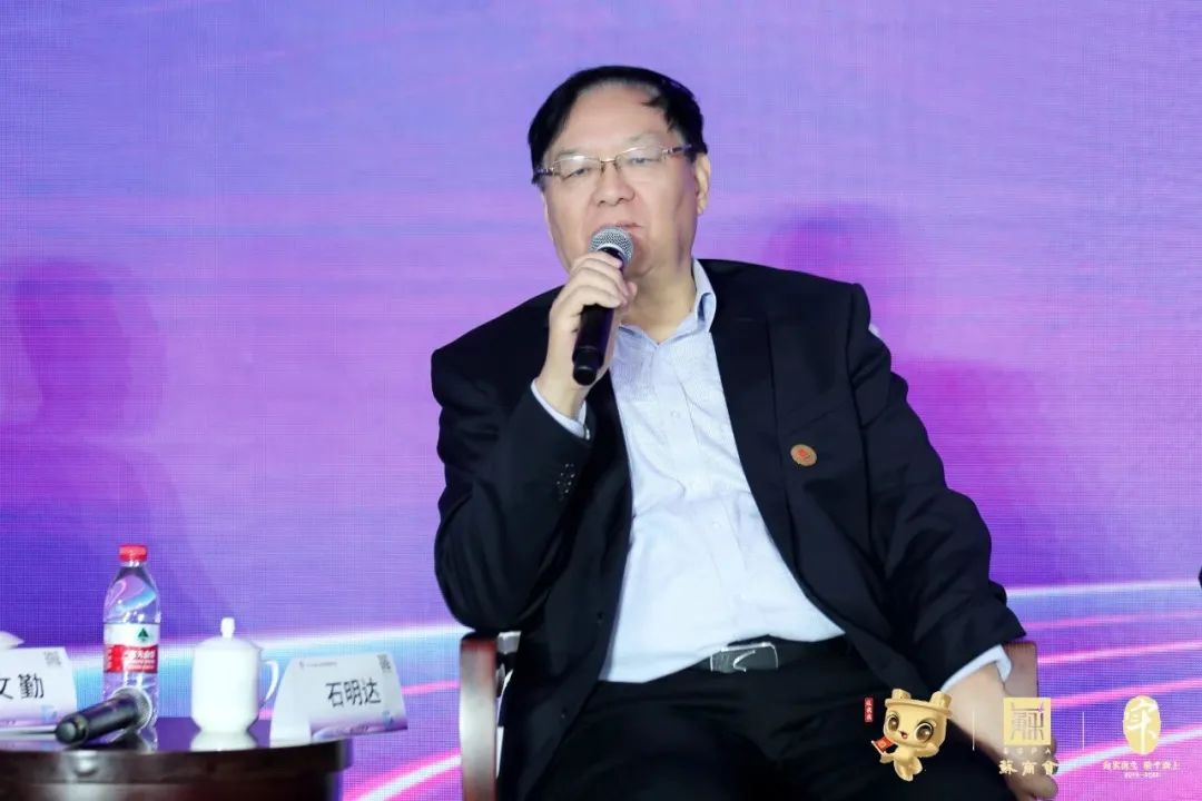 石明達